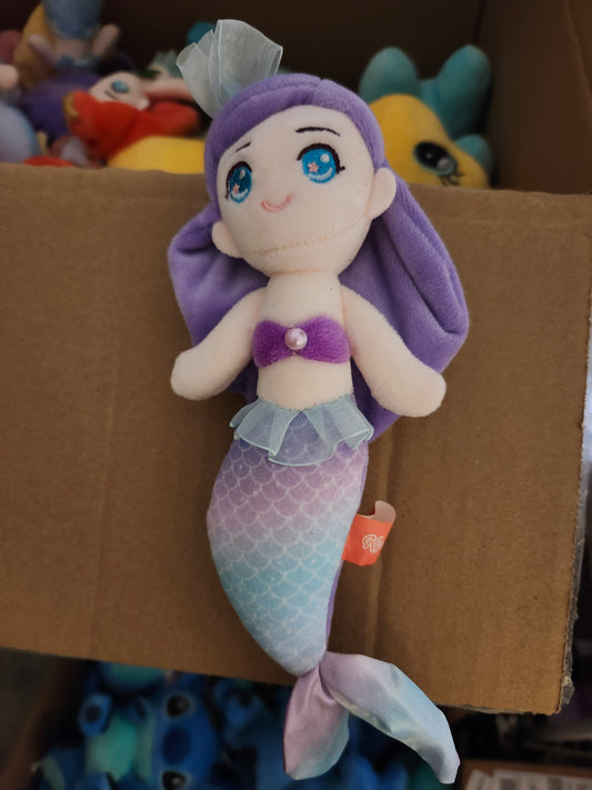 Mermaid stuffed toy w/bath bomb that has mermaid inside